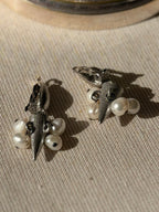 BALENCIAGA Boucles métal argenté perle