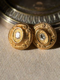 BALENCIAGA Clips baroques plaqués or et strass argenté central
