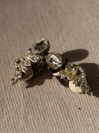 BALENCIAGA Boucles argentées grand strass arabesques et motif végétal