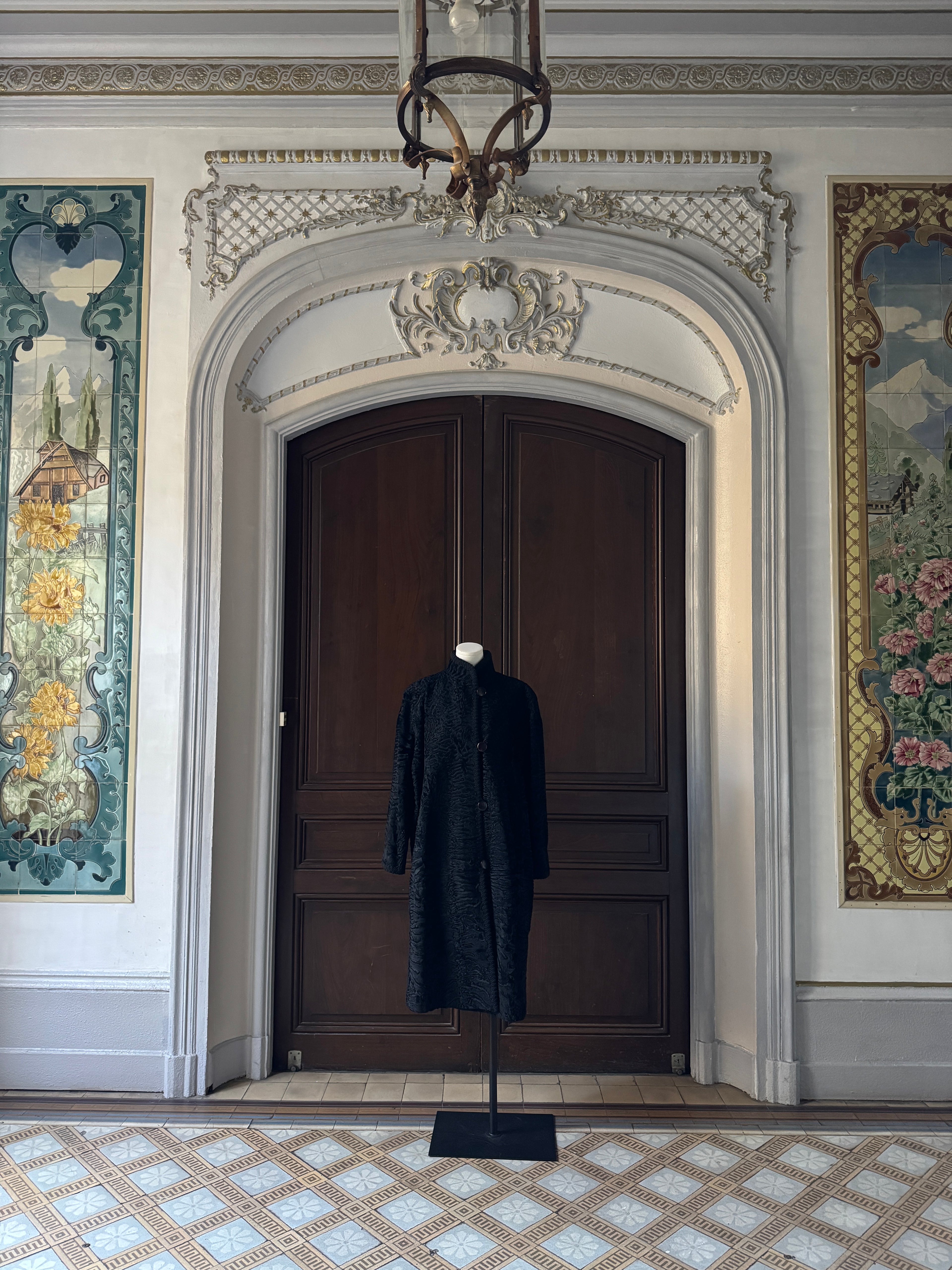 Manteau noir astrakan