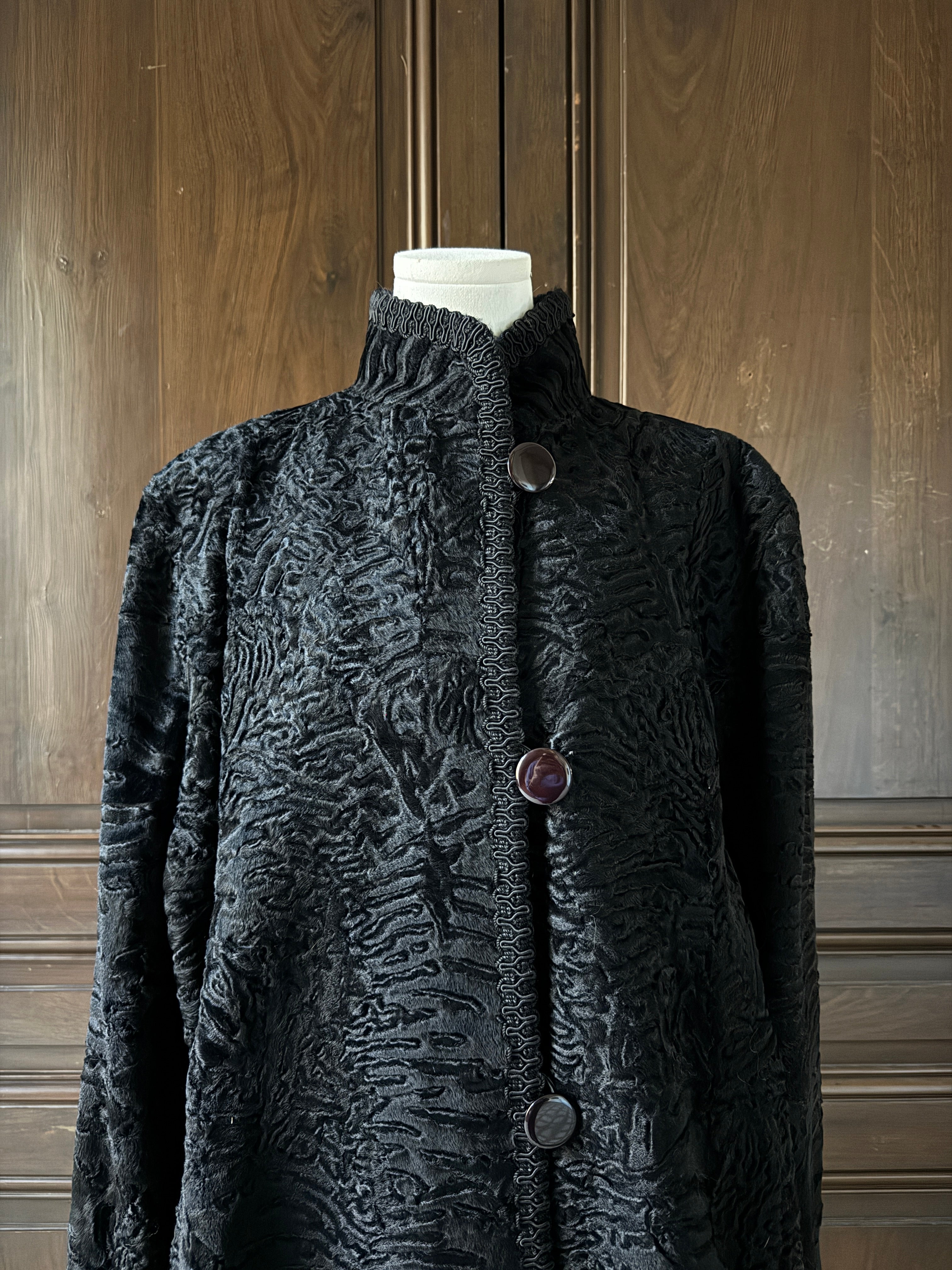 Manteau noir astrakan