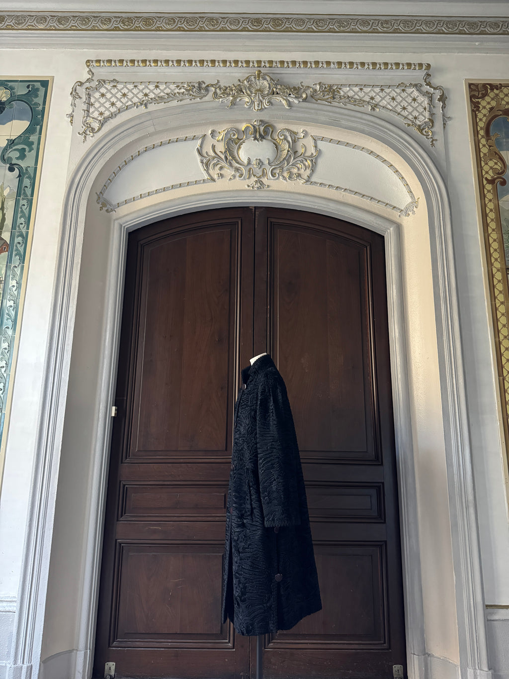 Manteau noir astrakan