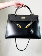 HERMES- Sac Kelly cuir noir