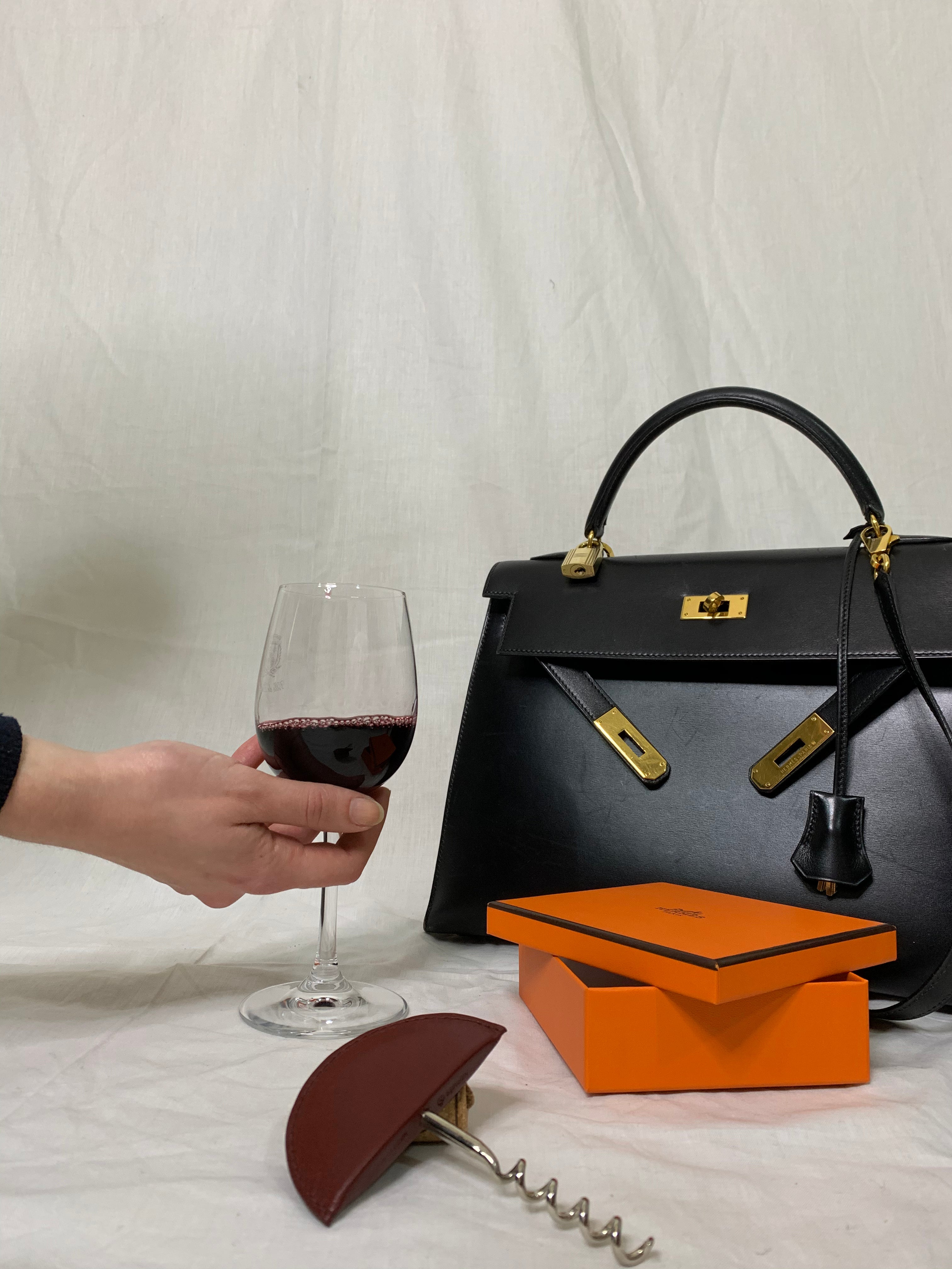 HERMÈS- Tir bouchon cuir